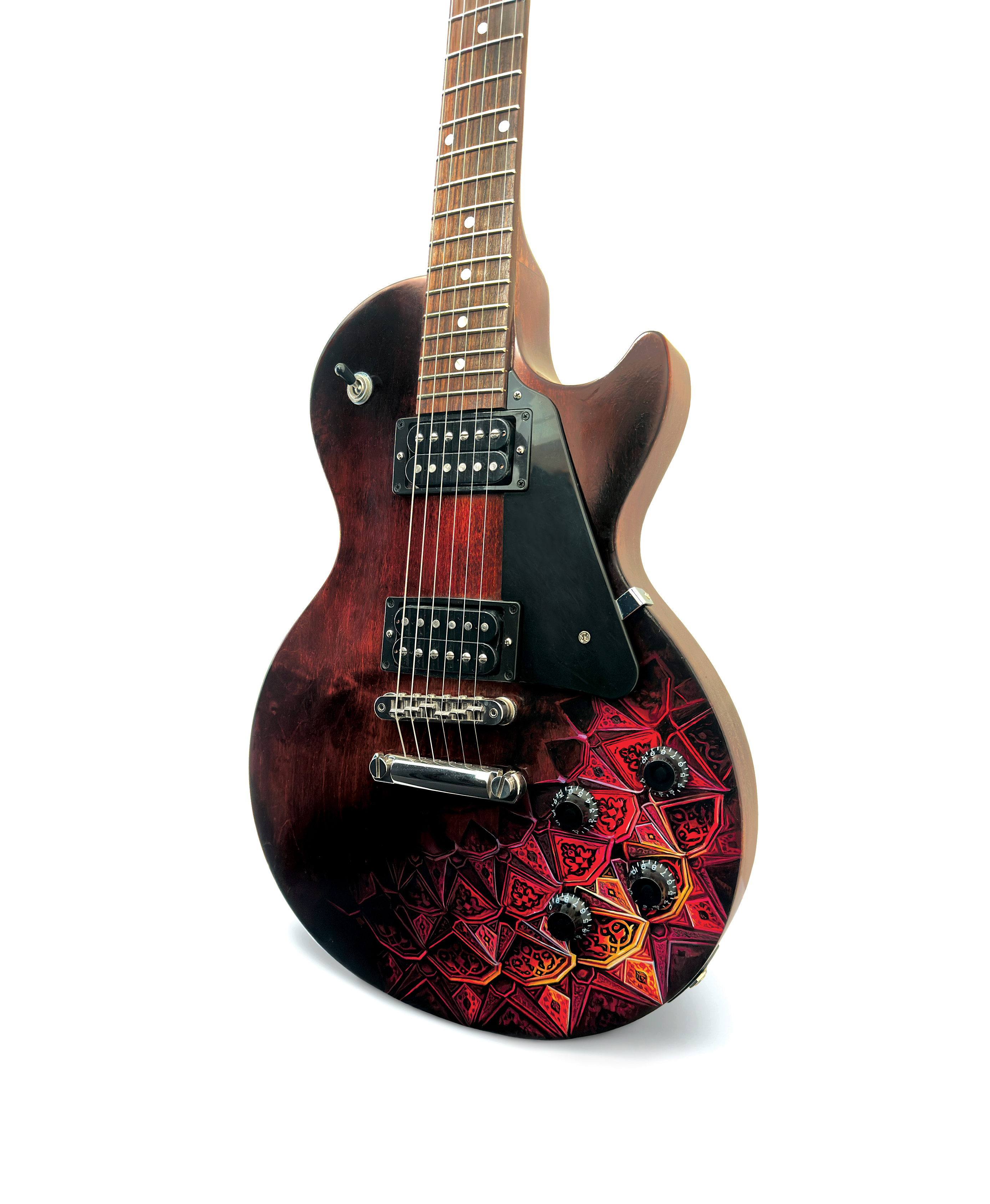 Agni, a dark electric guitar hand-painted with a red and orange geometric composition.