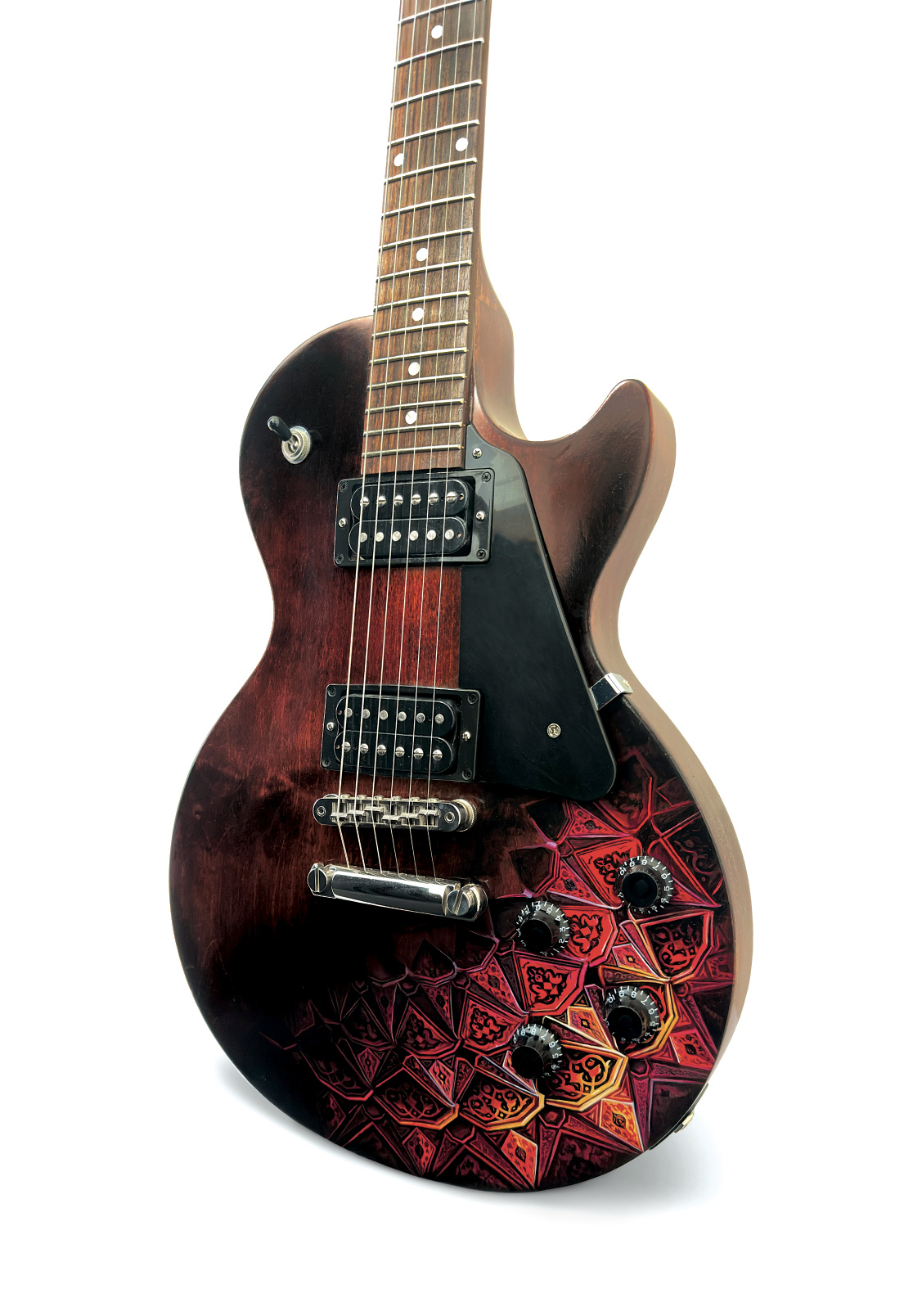 Dark single-cut electric guitar with a hand-painted red and orange geometric composition across its lower body.